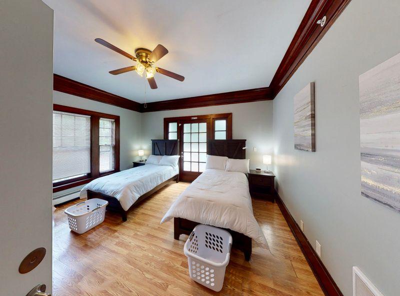 Bedroom clean, airy room with twin beds